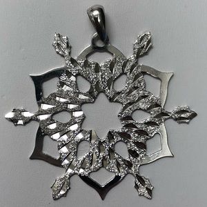 Sterling silver snowflake pendant